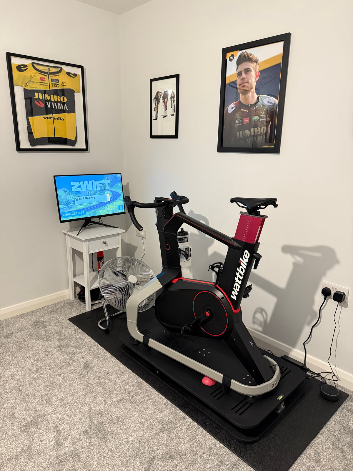 Indoor cycling rocker plate with Wattbike and Zwift training setup